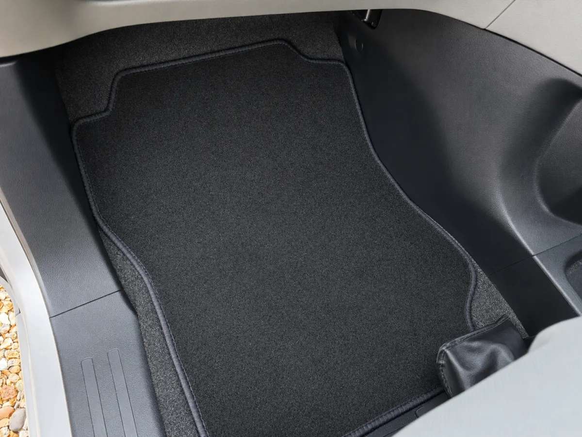 Clean black footwell after mobile car valet